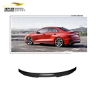 Carbon fibre rear trunk spoiler wing for Audi A3 S3 RS3 8Y on a red Audi A3 sedan
