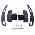 Black pedal shifters of an Audi A3