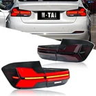 BMW 3 Series F30 LED tail lights installed on white sedan showing rear running light mode